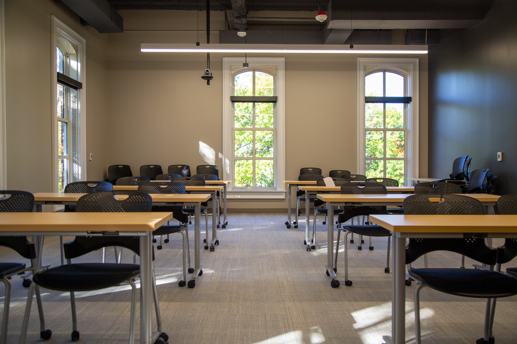 Caper chairs with mesh seating provide comfort for students in this flexible classroom space.