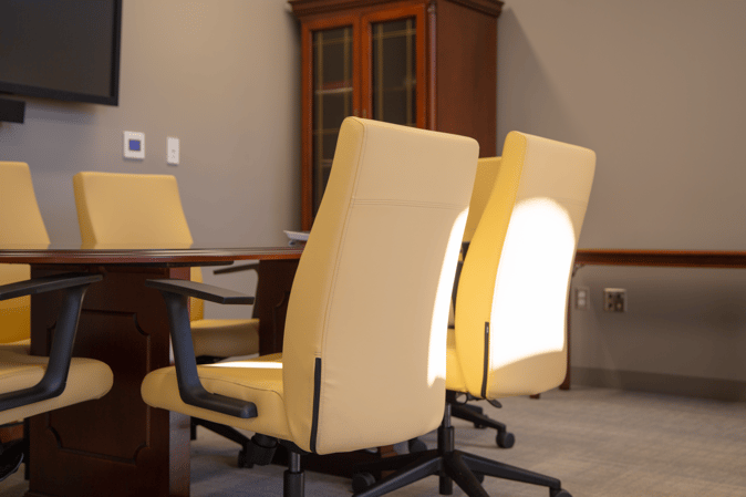 A look inside the Dean's office shows us a beautiful blend of comfortable modern chairs/technology and traditional design.